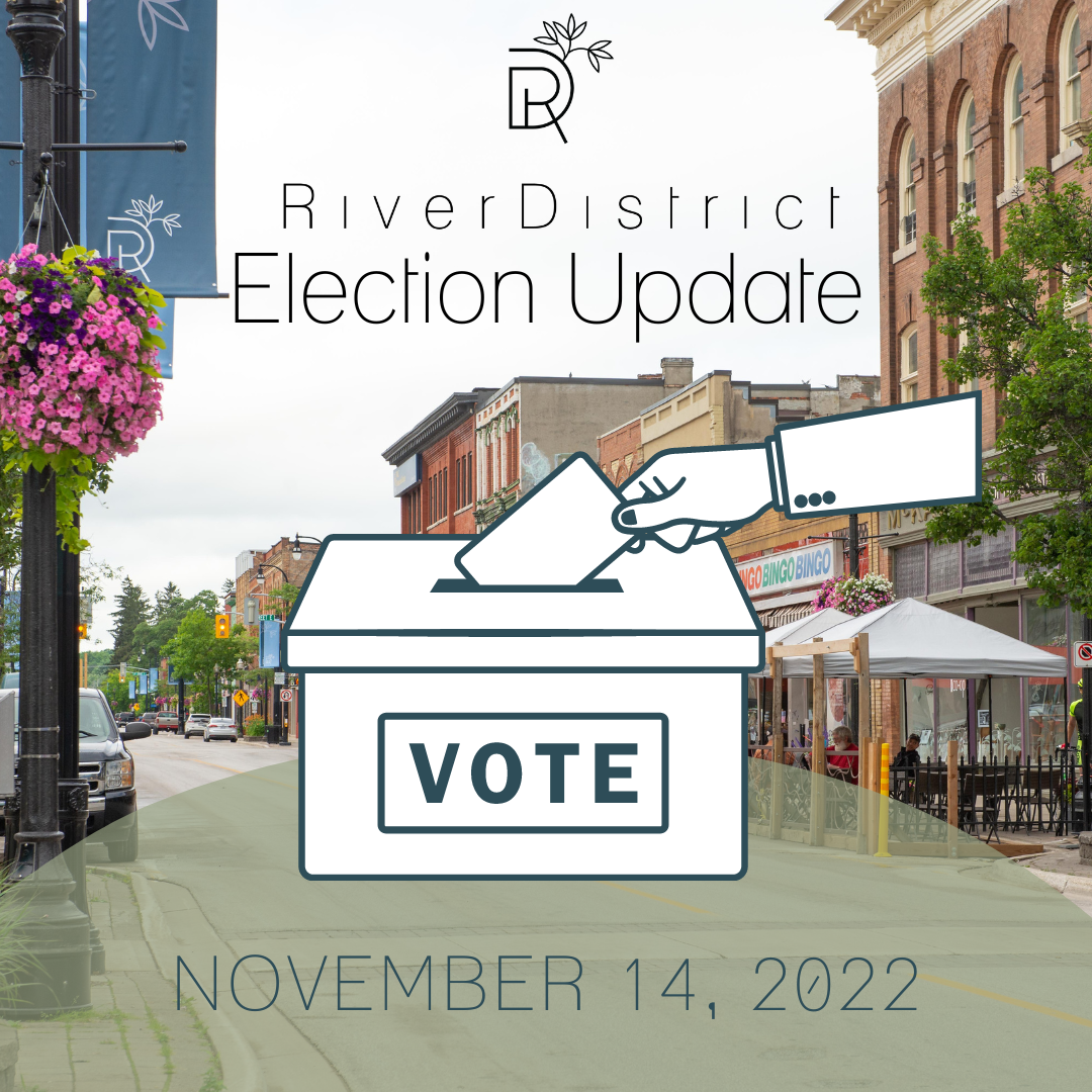 river district banners and patios with a voters box in front of the image