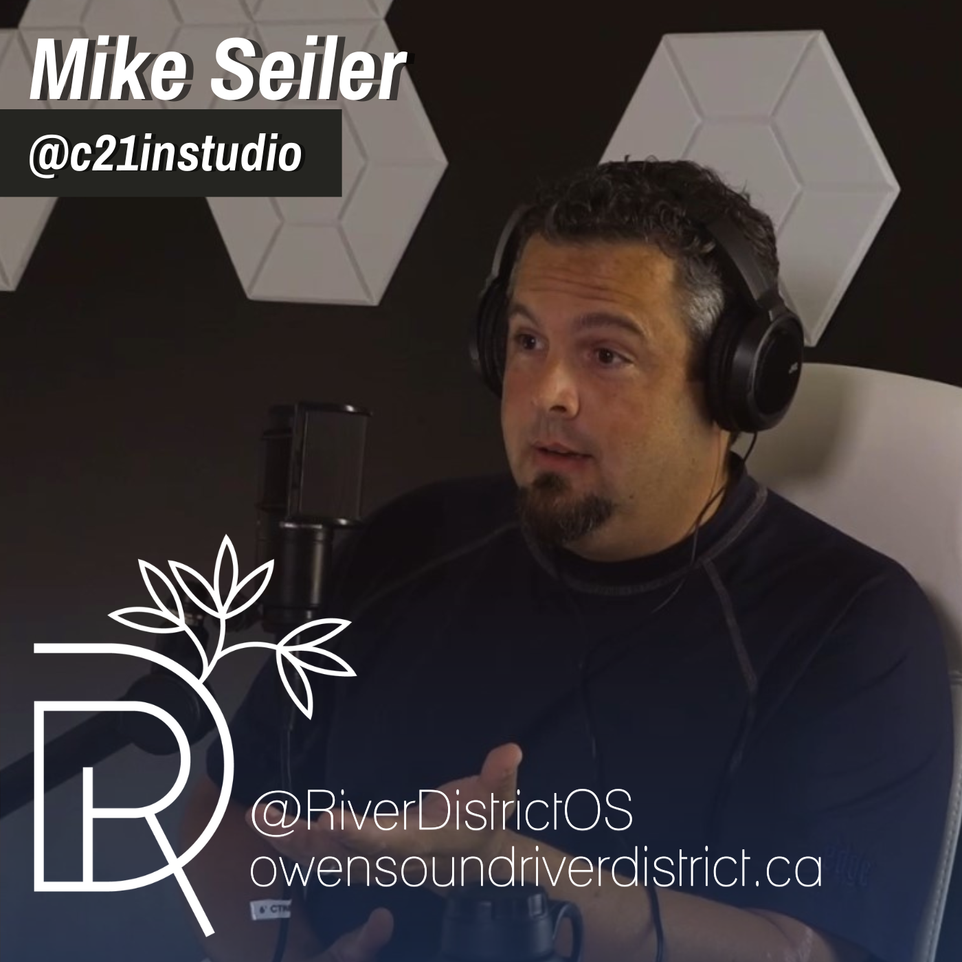 Mike Seiler in front of a podcast microphone