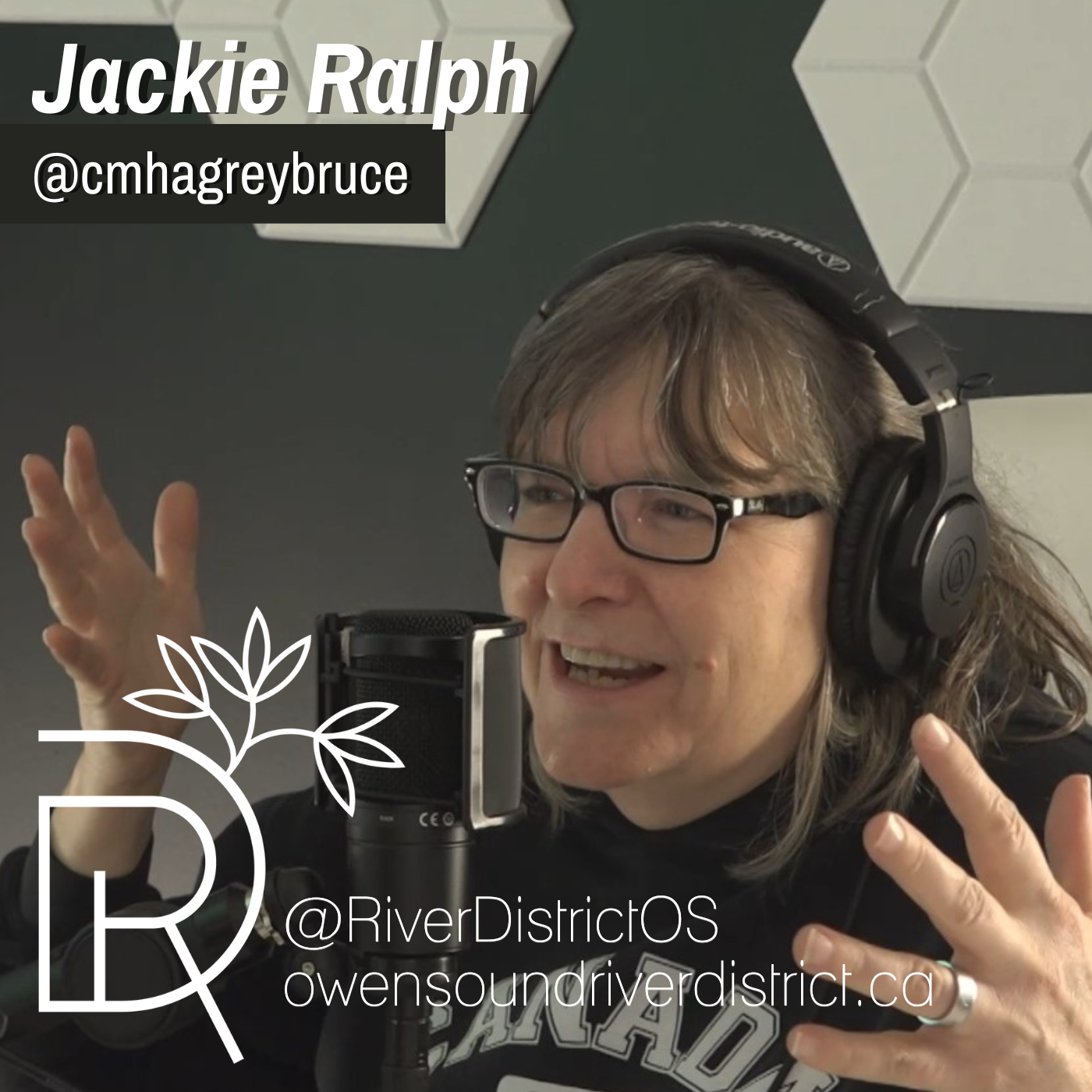 jackie ralph in front of a podcast microphone