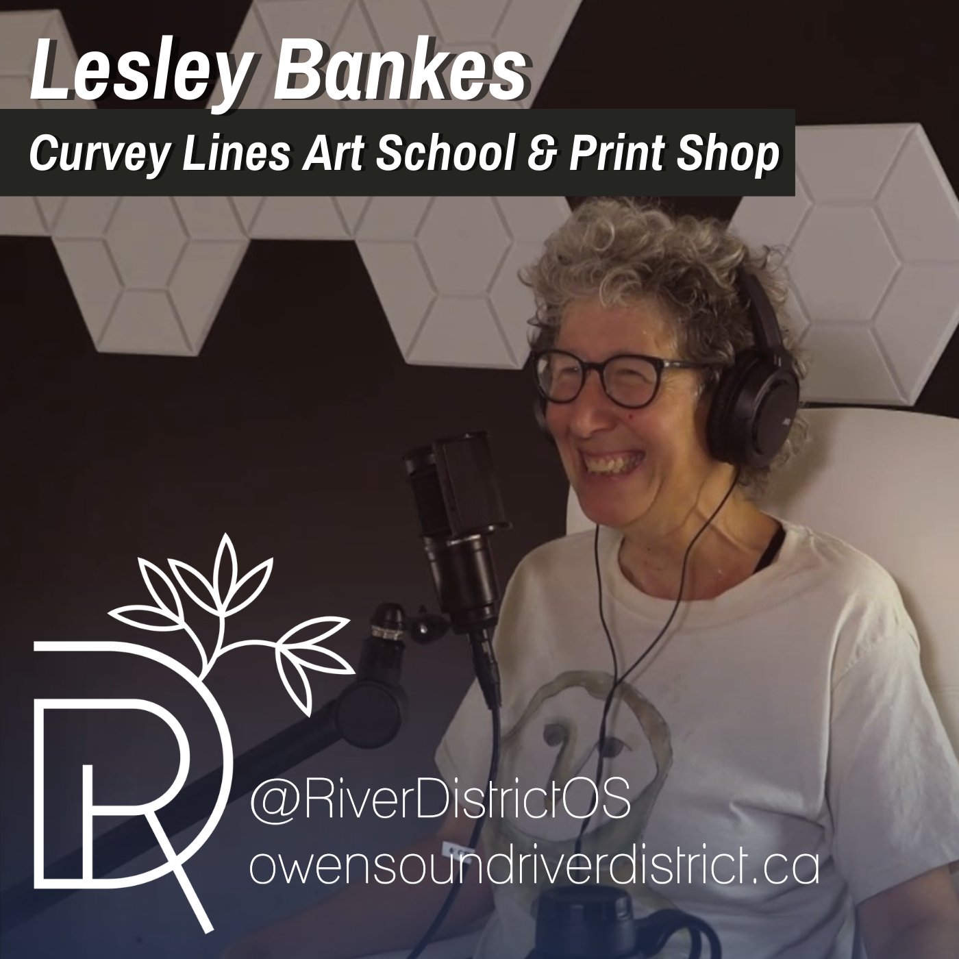 Lesley Bankes in front of podcast microphone