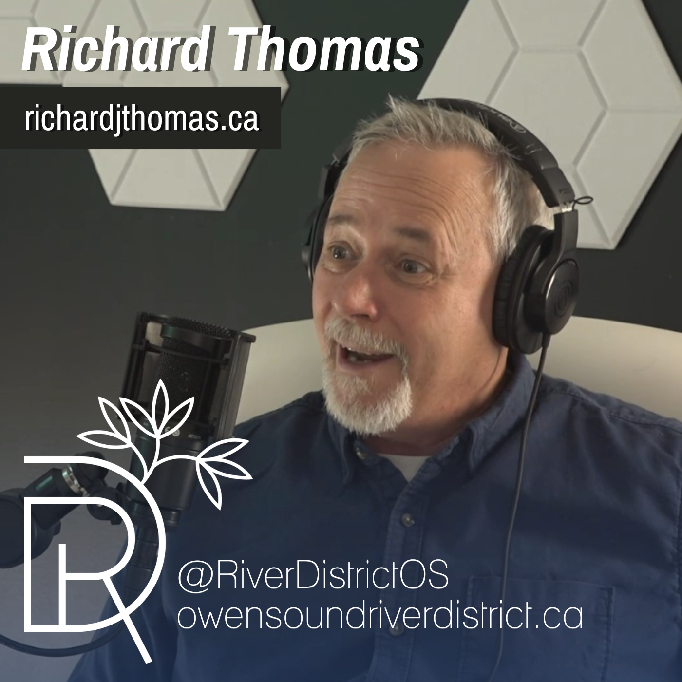 Richard Thomas in front of a podcast microphone wearing headphones