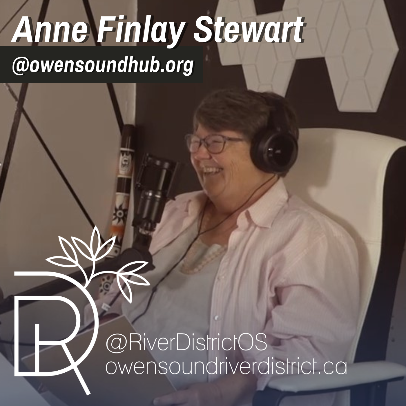 Image of Anne Finlay Stewart smiling behind a podcast microphone