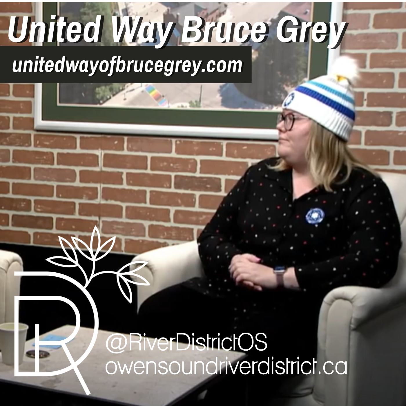 Kristy Andre in Rogers Studio wearing black shirt and white hat