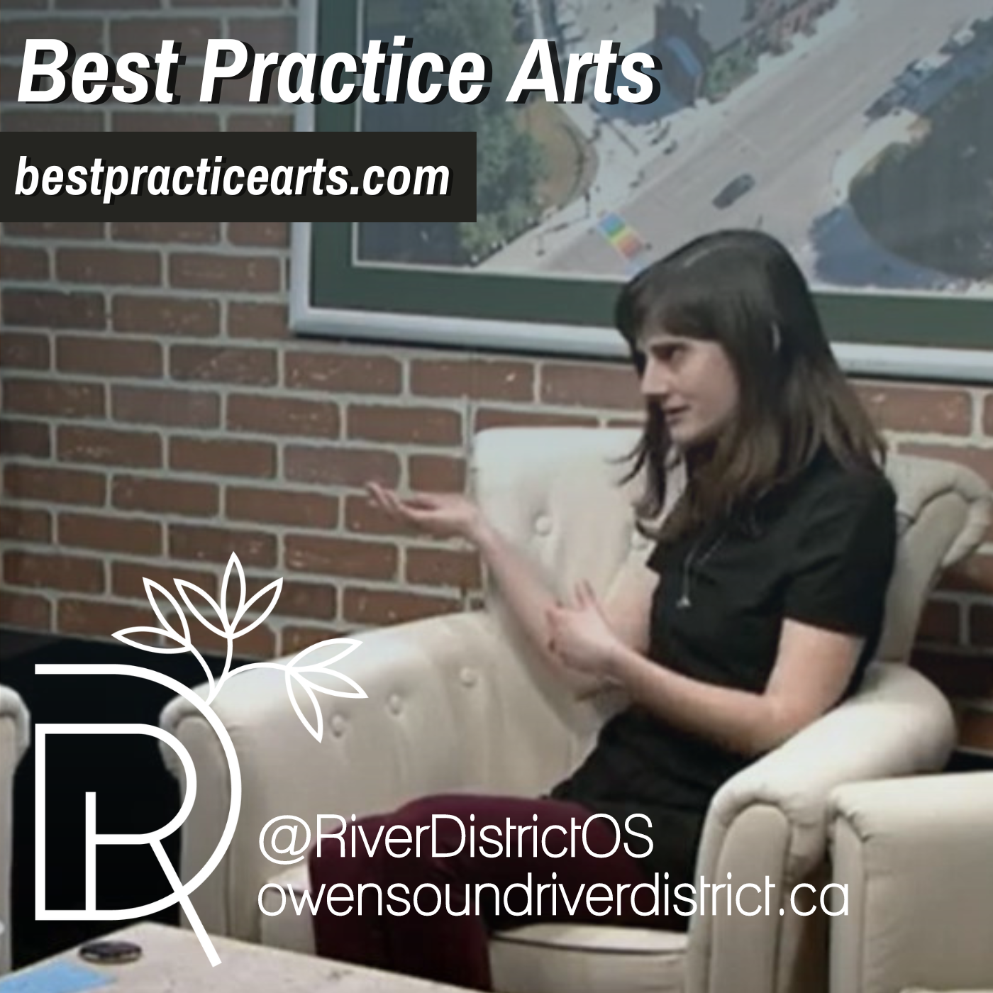 lauren best with hands moving and big smile in rogers studio with faux brick wall behind